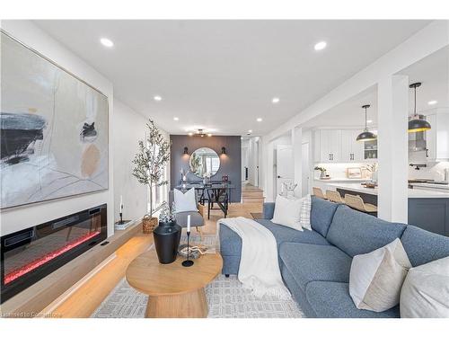 20 Walter Avenue S, Hamilton, ON - Indoor Photo Showing Living Room With Fireplace