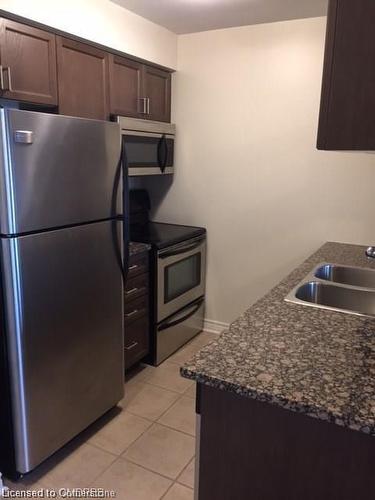 608-2379 Central Park Drive, Oakville, ON - Indoor Photo Showing Kitchen With Stainless Steel Kitchen With Double Sink