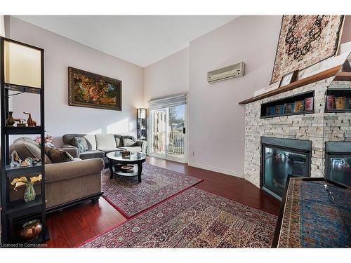 30-80 Old Country Drive, Kitchener, ON - Indoor Photo Showing Living Room With Fireplace