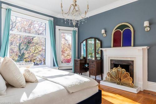 114 Aberdeen Avenue, Hamilton, ON - Indoor Photo Showing Bedroom With Fireplace