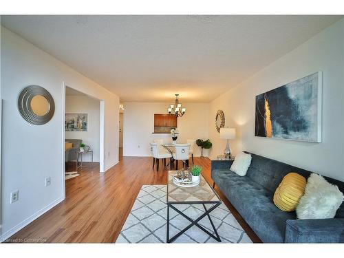 705-1270 Maple Crossing Boulevard, Burlington, ON - Indoor Photo Showing Living Room