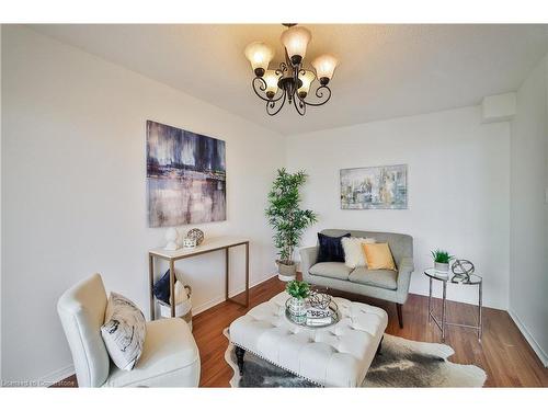 705-1270 Maple Crossing Boulevard, Burlington, ON - Indoor Photo Showing Living Room