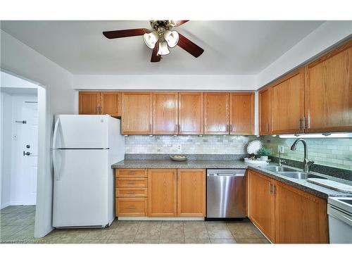 705-1270 Maple Crossing Boulevard, Burlington, ON - Indoor Photo Showing Kitchen With Double Sink