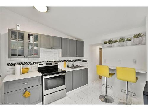 145 Cathcart Street, Hamilton, ON - Indoor Photo Showing Kitchen With Double Sink