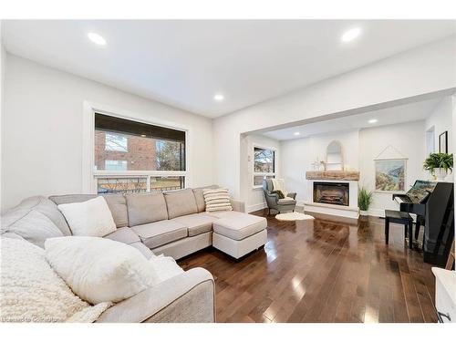 21 East 19Th Street, Hamilton, ON - Indoor Photo Showing Living Room With Fireplace