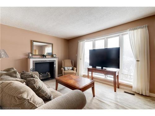 1353 Fisher Avenue, Burlington, ON - Indoor Photo Showing Living Room With Fireplace