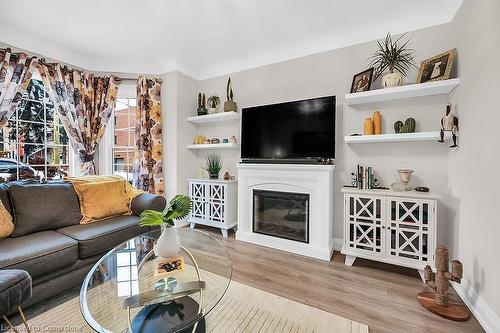 214 East Avenue N, Hamilton, ON - Indoor Photo Showing Living Room With Fireplace