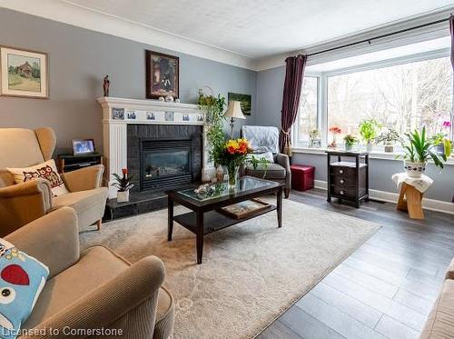 539 Mohawk Road W, Hamilton, ON - Indoor Photo Showing Living Room With Fireplace