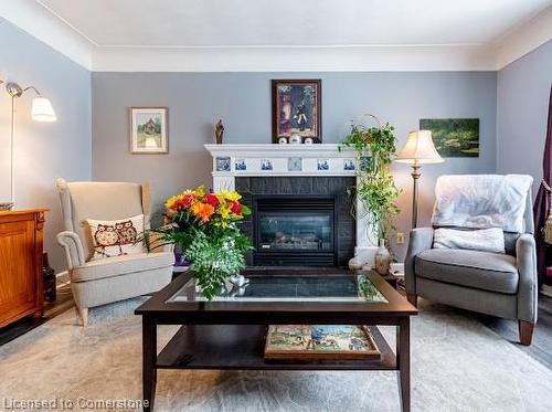 539 Mohawk Road W, Hamilton, ON - Indoor Photo Showing Living Room With Fireplace