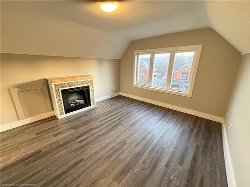 691 Wilson Street, Hamilton, ON - Indoor Photo Showing Other Room With Fireplace