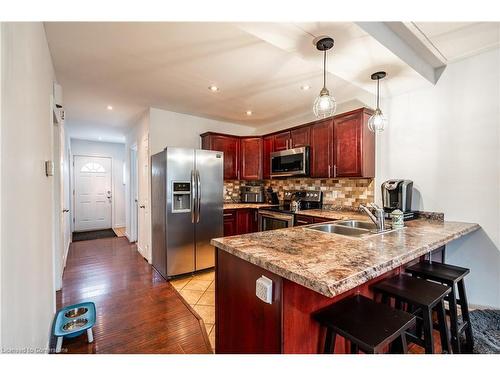 76 Park Row N, Hamilton, ON - Indoor Photo Showing Kitchen With Double Sink