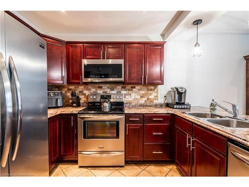 76 Park Row N, Hamilton, ON - Indoor Photo Showing Kitchen With Double Sink