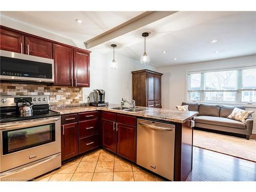 76 Park Row N, Hamilton, ON - Indoor Photo Showing Kitchen With Double Sink