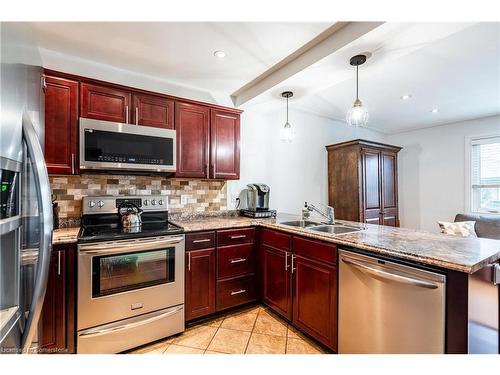 76 Park Row N, Hamilton, ON - Indoor Photo Showing Kitchen With Double Sink