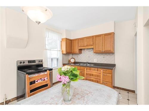 62 Francis Street, Hamilton, ON - Indoor Photo Showing Kitchen With Double Sink