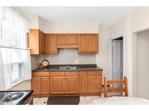 62 Francis Street, Hamilton, ON - Indoor Photo Showing Kitchen With Double Sink