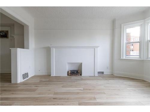 106 Weir Street N, Hamilton, ON - Indoor With Fireplace