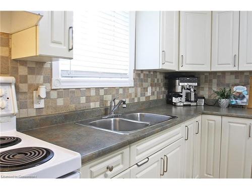 129 Birge Street, Hamilton, ON - Indoor Photo Showing Kitchen With Double Sink