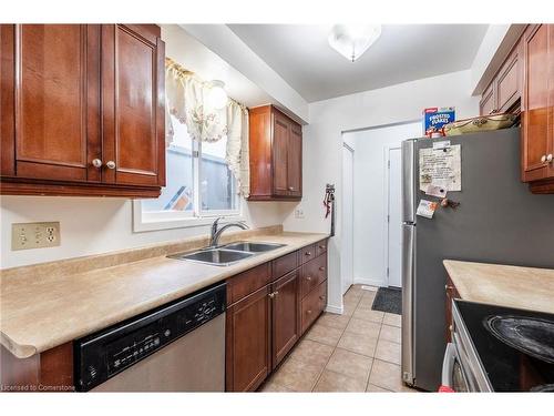 97 Guildwood Drive, Hamilton, ON - Indoor Photo Showing Kitchen With Double Sink