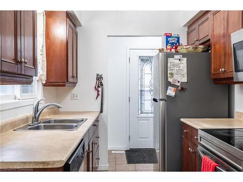 97 Guildwood Drive, Hamilton, ON - Indoor Photo Showing Kitchen With Double Sink