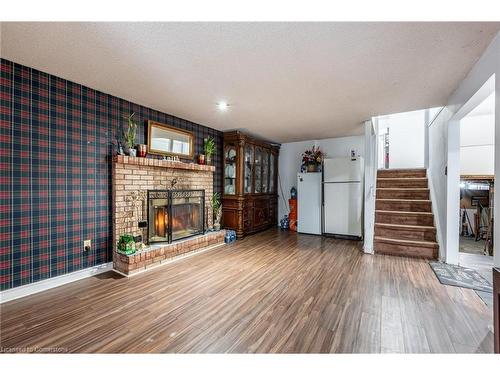 97 Guildwood Drive, Hamilton, ON - Indoor Photo Showing Living Room With Fireplace