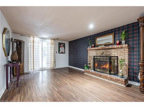 97 Guildwood Drive, Hamilton, ON - Indoor Photo Showing Living Room With Fireplace