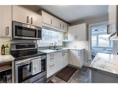 312 Wexford Avenue S, Hamilton, ON - Indoor Photo Showing Kitchen With Double Sink