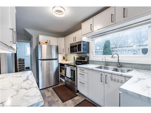 312 Wexford Avenue S, Hamilton, ON - Indoor Photo Showing Kitchen With Double Sink