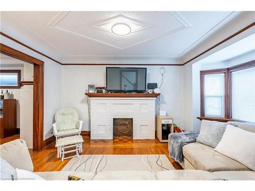 312 Wexford Avenue S, Hamilton, ON - Indoor Photo Showing Living Room With Fireplace