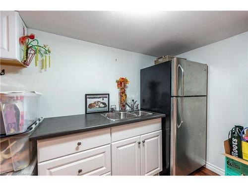 312 Wexford Avenue S, Hamilton, ON - Indoor Photo Showing Kitchen With Double Sink