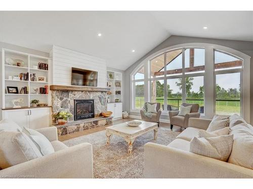 1080 Clyde Road, Cambridge, ON - Indoor Photo Showing Living Room With Fireplace