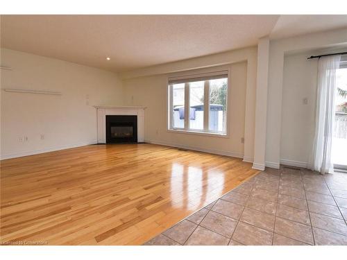 53 Dulgaren Street, Hamilton, ON - Indoor Photo Showing Living Room With Fireplace