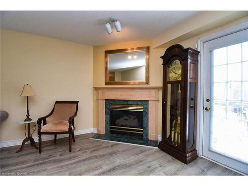 151 Dicenzo Drive, Hamilton, ON - Indoor Photo Showing Living Room With Fireplace