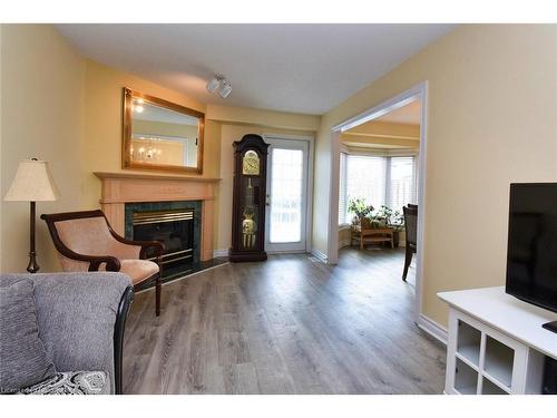 151 Dicenzo Drive, Hamilton, ON - Indoor Photo Showing Living Room With Fireplace