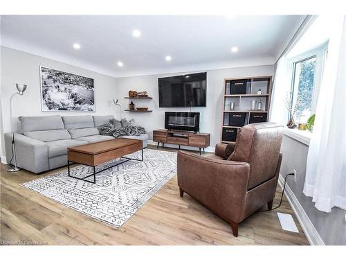 176 East 43Rd Street, Hamilton, ON - Indoor Photo Showing Living Room With Fireplace