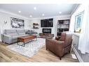 176 East 43Rd Street, Hamilton, ON  - Indoor Photo Showing Living Room With Fireplace 