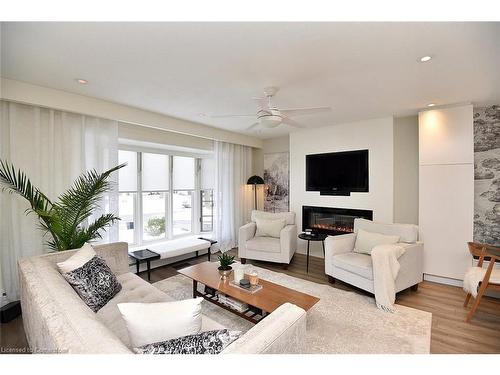 672 Montego Crescent, Burlington, ON - Indoor Photo Showing Living Room With Fireplace