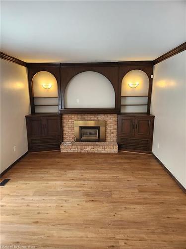 412 Quigley Road, Hamilton, ON - Indoor Photo Showing Other Room With Fireplace