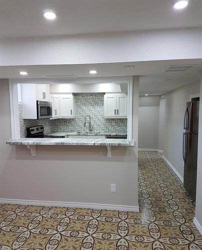 412 Quigley Road, Hamilton, ON - Indoor Photo Showing Kitchen