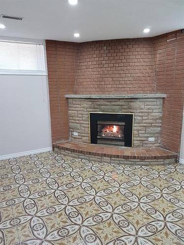 412 Quigley Road, Hamilton, ON - Indoor With Fireplace