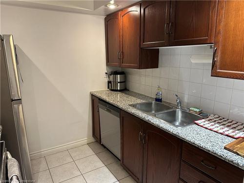 409-270 Wellington Street W, Toronto, ON - Indoor Photo Showing Kitchen With Double Sink