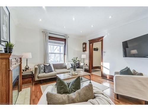 29 East 21St Street, Hamilton, ON - Indoor Photo Showing Living Room With Fireplace