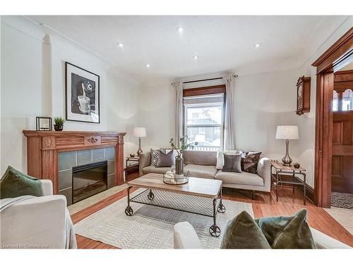 29 East 21St Street, Hamilton, ON - Indoor Photo Showing Living Room With Fireplace