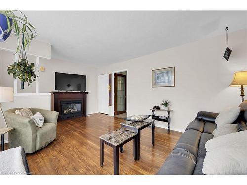 221 East 24Th Street, Hamilton, ON - Indoor Photo Showing Living Room With Fireplace