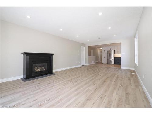 34 Robb Road, Woolwich, ON - Indoor Photo Showing Living Room With Fireplace