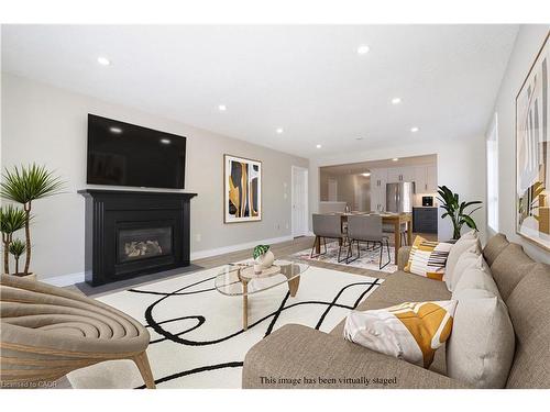 34 Robb Road, Woolwich, ON - Indoor Photo Showing Living Room With Fireplace