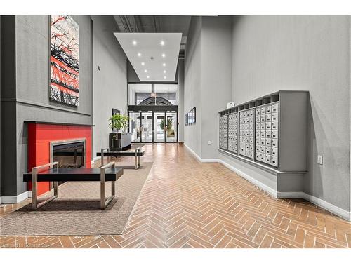 105-66 Bay Street S, Hamilton, ON - Indoor Photo Showing Other Room With Fireplace