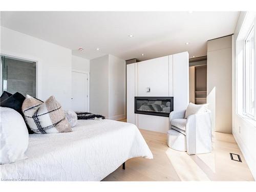 25 Shadyside Avenue, Hamilton, ON - Indoor Photo Showing Bedroom With Fireplace