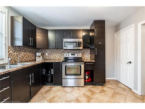 153 Connaught Avenue N, Hamilton, ON - Indoor Photo Showing Kitchen With Double Sink With Upgraded Kitchen