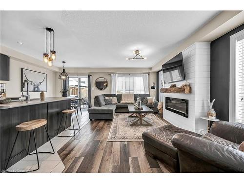 64 Arnold Marshall Boulevard, Caledonia, ON - Indoor Photo Showing Living Room With Fireplace